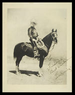 TOM MIX SEATED ON TONY OUTSTANDING SIGNED PHOTO INSCRIBED TO MIX’S BUSINESS MANAGER.