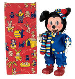 "MICKEY MOUSE" BOXED GUND DOLL.