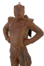 "THE ROCKETEER" BRONZE STATUE ON DECO BASE BY KENT MELTON.