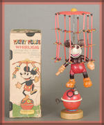 "MICKEY MOUSE WHIRLIGIG" RARE BOXED CELLULOID WIND-UP TOY.