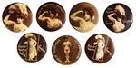 "CHARMION" VAUDEVILLE STRONG LADY COLLECTION OF SEVEN BUTTONS.