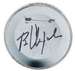 "RARE EARTH" 2012 CONCERT BUTTON SIGNED BY THE BUTTON DESIGNER.