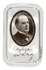 McKINLEY-TR JUGATE AND McKINLEY FACSIMILE AUTOGRAPHED PAPERWEIGHT PAIR.