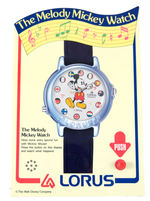 "THE MELODY MICKEY MOUSE WATCH" LOT WITH MUSICAL STORE DISPLAY.