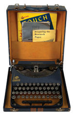 NYWF 1939 “REMINGTON” TYPEWRITER IN CASE WITH PUBLICATIONS.
