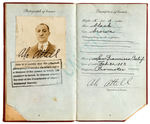 ABE ATTELL CHAMPION BOXER AND “BLACK SOCKS” FIGURE SIGNED AND INSCRIBED PHOTO WITH PASSPORT.