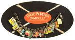 “PIXIE PLATTER BRACELET” ORIGINAL CARD HOLDING CHARM BRACELET WITH 15 REPLICA RECORD ALBUMS.
