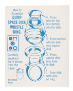 QUISP SPACE DISK WHISTLE RING WITH INSTRUCTIONS FROM 1966.