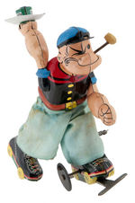 "ROLLER SKATER POPEYE" BOXED LINEMAR WIND-UP TOY.