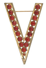 LARGE "V" PIN WITH 18 RUBY RED RHINESTONES.