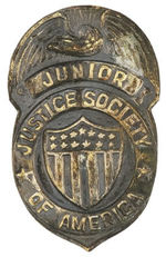 "JUNIOR JUSTICE SOCIETY OF AMERICA" 1942 BADGE WITH RARE VARIETY PIN ON REVERSE.