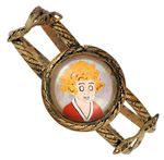 OUTSTANDING ELABORATE ANNIE BRACELET WITH REVERSE ON GLASS PORTRAIT.