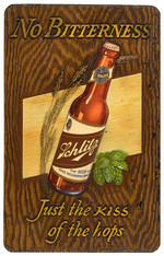 "SCHLITZ BEER NO BITTERNESS JUST THE KISS OF THE HOPS" EMBOSSED SIGN.