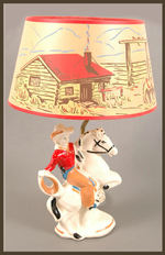 COWBOY/WESTERN CERAMIC LAMP WITH SHADE.