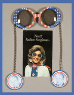 FORD FUNKY SUNGLASSES WITH CHAIN TEMPLES AND PICTORIAL DANGLES & CARD FOR NON-FORD VERSION FROM 1976