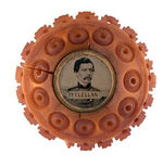 “McCLELLAN” FERROTYPE SET INTO A VEGETABLE IVORY CLOTHING BUTTON.