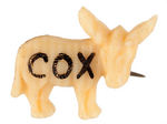 “COX” SMALL CELLULOID DONKEY 1920 CAMPAIGN PIN.
