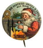 SUPERBLY COLORED 1930s BUTTON WITH SANTA HOLDING DOLL BY GLOWING FIREPLACE.