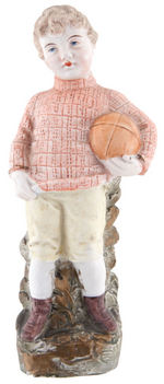 EARLY FOOTBALL PLAYER HAND PAINTED BISQUE FIGURINE.
