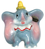 “BABY DUMBO” FIGURINE BY AMERICAN POTTERY.