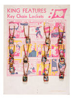 "KING FEATURES KEY CHAIN LOCKETS" FULL DISPLAY.