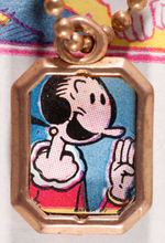 "KING FEATURES KEY CHAIN LOCKETS" FULL DISPLAY.