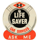 “D-X” GASOLINE “LIFE SAVER” DIE-CUT CARDBOARD BADGE.