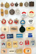 KEY FOB COLLECTION OF 36 PIECES WITH CAR NAMES AND/OR INSIGNIAS.