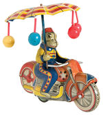 MONKEY ON MOTORCYCLE WITH PARASOL FRICTION TOY.