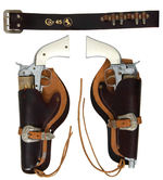 HUBLEY “COLT 45” CAP GUN PAIR WITH BELT AND HOLSTERS.