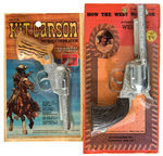 “KIT CARSON/HOW THE WEST WAS WON” CARDED CAP PISTOL PAIR.