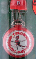 AMERICAN AND NATIONAL LEAGUE TEAMS LOT OF FOUR POCKET WATCHES IN STORE CONTAINERS.