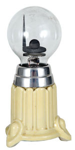 1939 NEW YORK WORLD'S FAIR LAMP WITH TRYLON & PERISPHERE FILAMENT BULB.