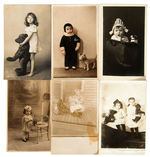 KIDS WITH TOYS AND DOLLS REAL PHOTO POSTCARDS.