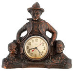 “WILL ROGERS” FIGURAL CAST METAL ELECTRIC MANTLE CLOCK.