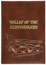 “VALLEY OF THE CLIFFHANGERS” IMPRESSIVE LARGE BOUND REPUBLIC SERIAL BOOK & SUPPLEMENT.