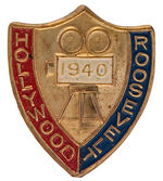 "HOLLYWOOD ROOSEVELT 1940" BRASS PIN SHOWING 35MM MOVIE CAMERA.