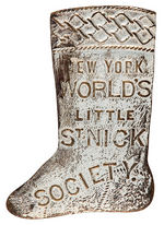 WONDERFUL CIRCA 1890s FIGURAL CHRISTMAS STOCKING BADGE "NEW YORK WORLD'S LITTLE ST. NICK SOCIETY."