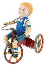UNIQUE ART EARLY VERSION KIDDIE CYCLIST WIND-UP TOY.