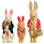 EASTER RABBIT WIND-UP TOY AND RABBIT FIGURES.
