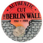 AUTHENTIC CUT/THE BERLIN WALL/1961 TO 1989" BUTTON WITH ACTUAL PIECE OF WALL ATTACHED.