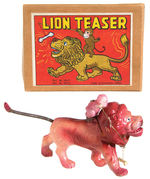 “LION TEASER” BOXED CELLULOID WIND-UP.