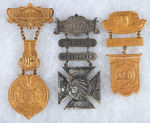 THREE LARGE FIRE CONVENTION "DELEGATE" BADGES.