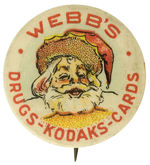 EARLY AND RARE ST. LOUIS BUTTON CO. SANTA DESIGN ADVERTISES “DRUGS-KODAKS-CARDS.”