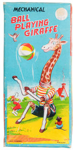 BOXED BALL PLAYING GIRAFFE WIND-UP BY TPS.