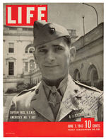 WORLD WAR II FIGHTER ACE JOE FOSS SIGNED “LIFE” MAGAZINE COVER AND BUTTON.