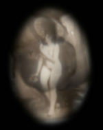 WHITE METAL RING WITH STANHOPE IMAGE OF NUDE WOMAN HOLDING PARASOL.
