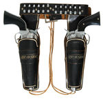 “RIC O’SHAY” LEATHER GUN BELT AND HOLSTERS WITH CAP GUN REVOLVERS BY HUBLEY.