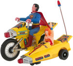 SUPERMAN & WONDER WOMAN BOXED BATTERY-OPERATED MOTORCYCLE.