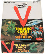 "V THE SERIES" LOT WITH FIGURE, PISTOL AND TRADING CARD BOX.